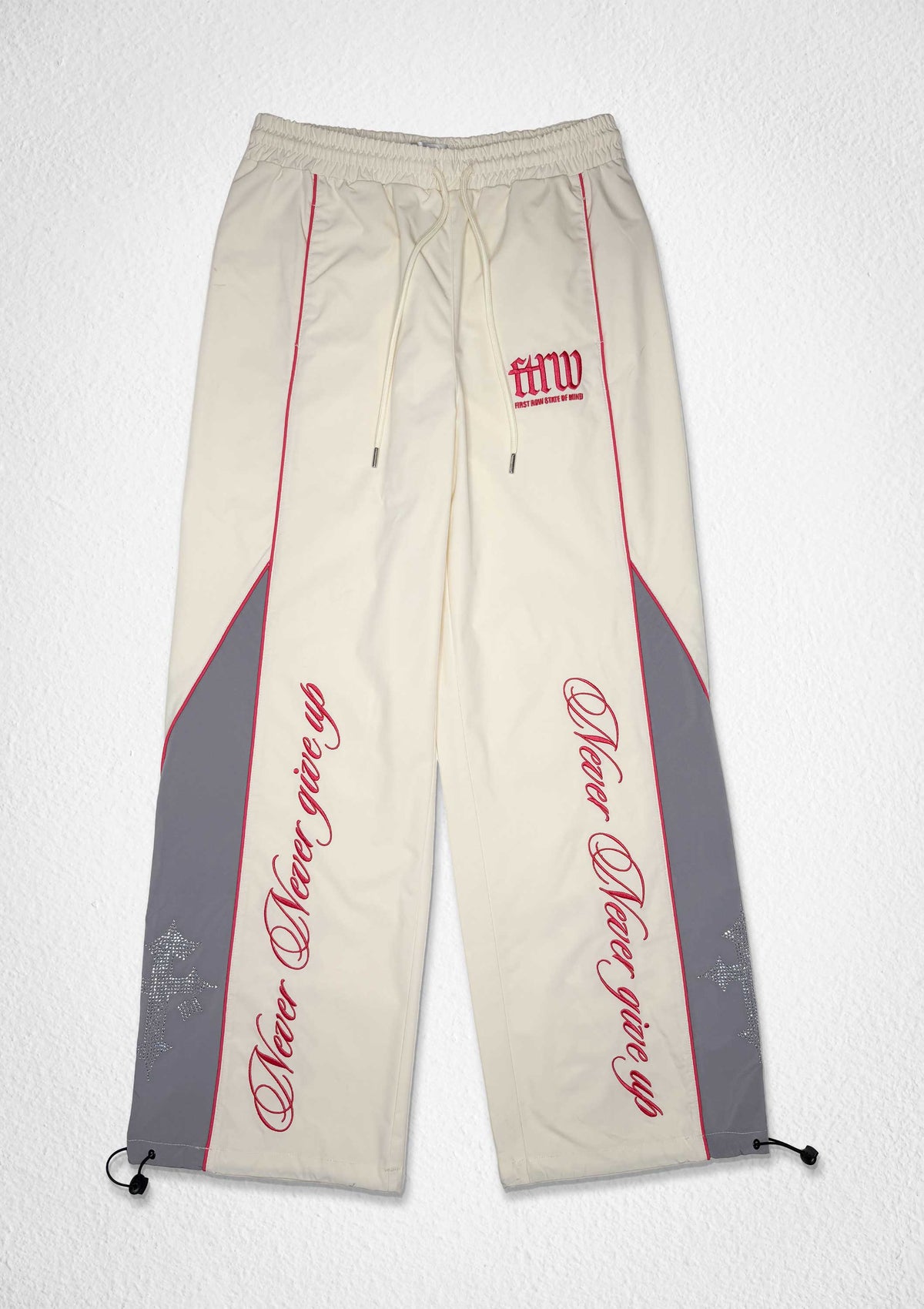 PROPERTY OF FIRST ROW TRACK PANTS