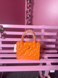 Orange cream barrel bag